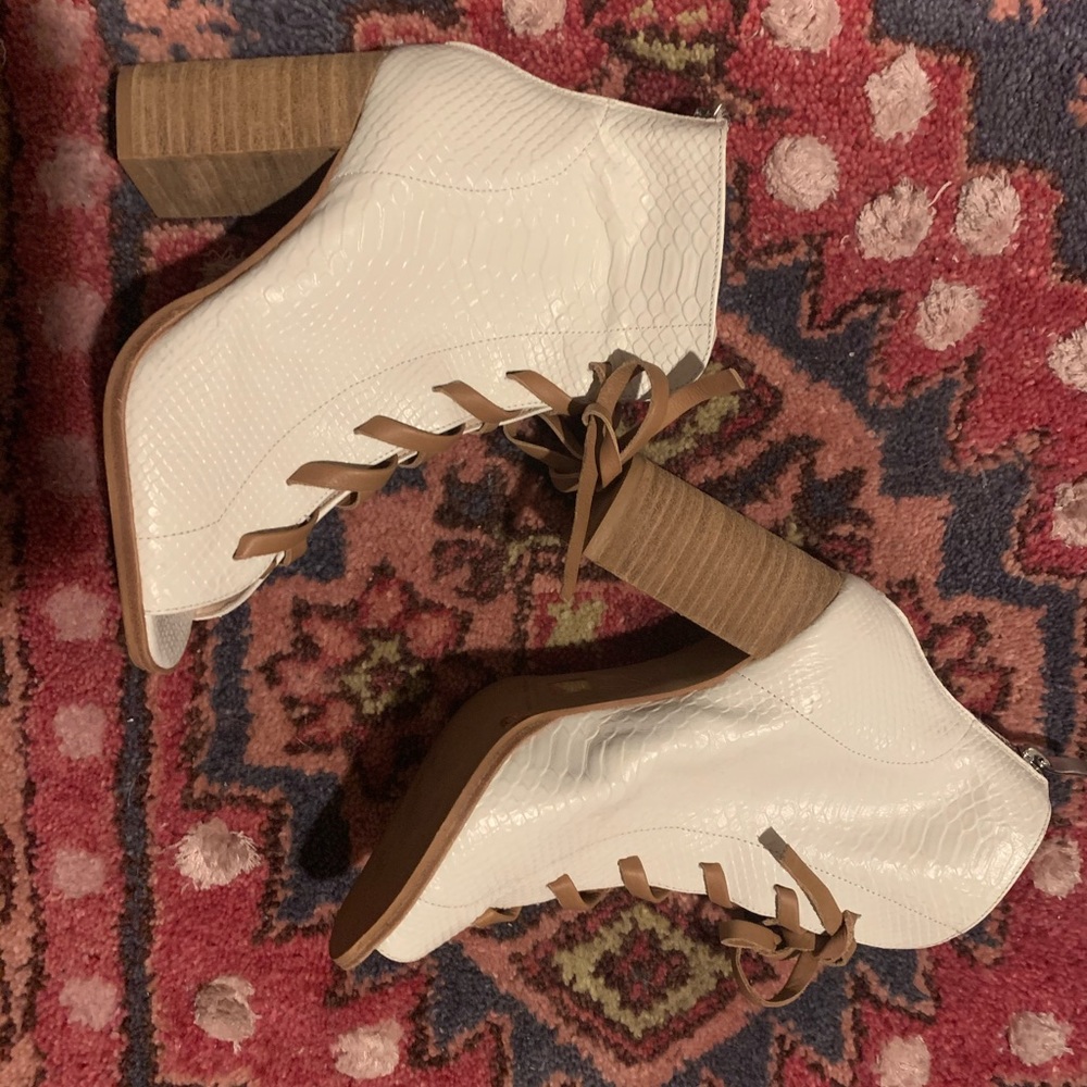 Kristin Cavallari lace up boots